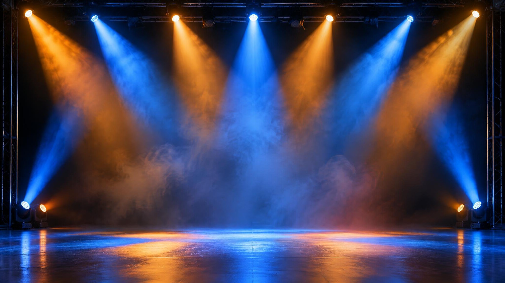 Concert stage with coloured spotlight beams